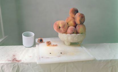 Peaches in fruit basket