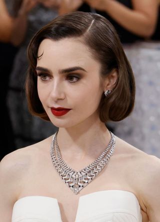 Lily Collins attends the 2023 Costume Institute Benefit celebrating "Karl Lagerfeld: A Line of Beauty" in New York City