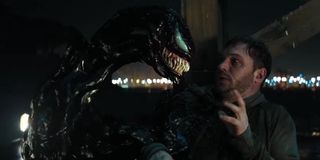 Tom Hardy looking at symbiote in Venom