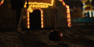 candy apple in the sand in Us