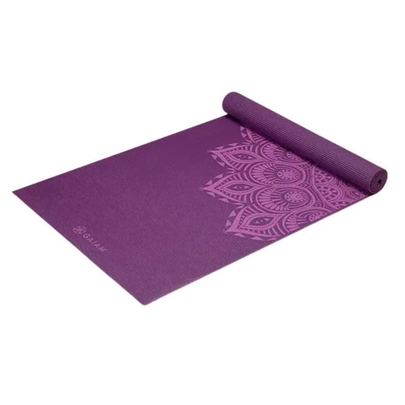 A thick purple Gaiam yoga mat.