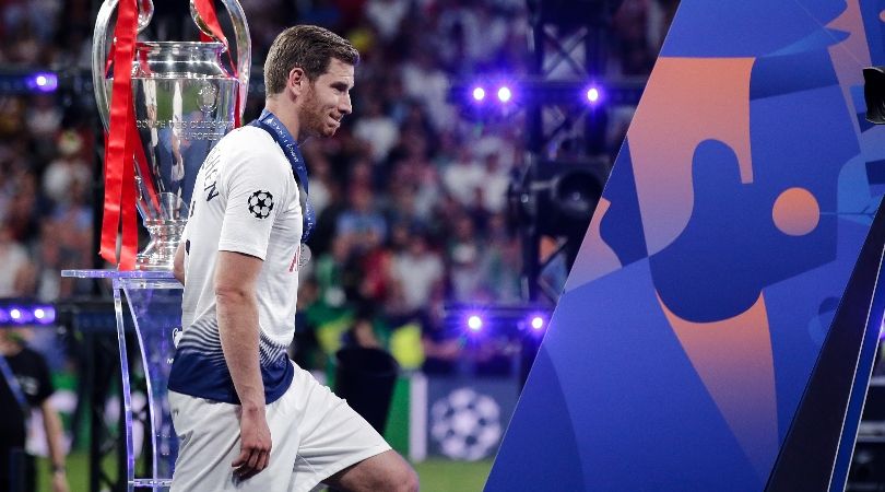 Tottenham&#039;s Jan Vertonghen walks past the Champions League trophy after defeat to Liverpool in Madrid in 2019.