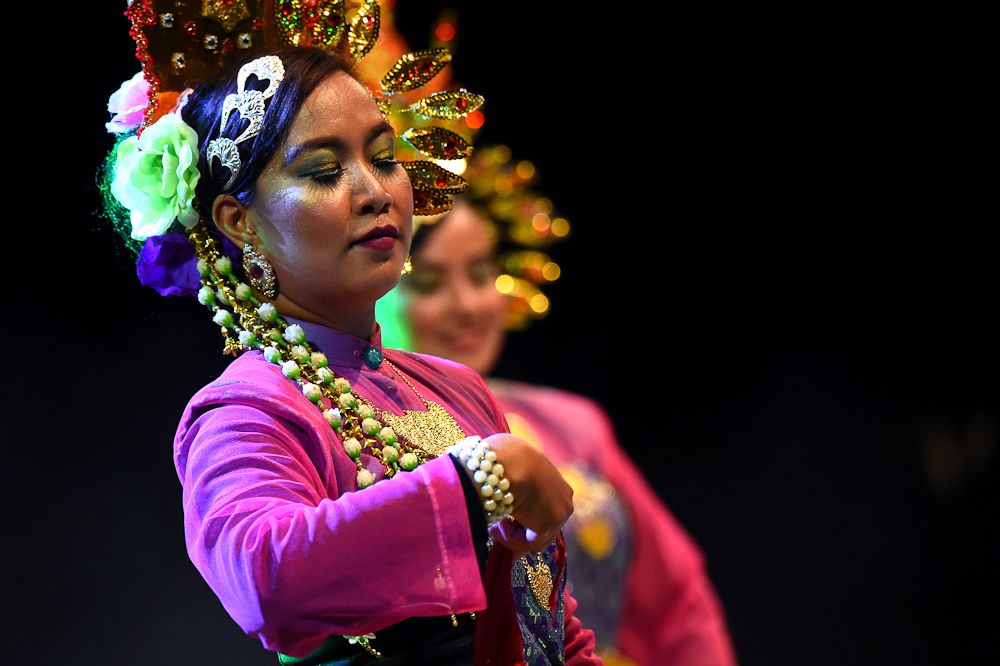 Dancers entertain the crowd at the Tour de Langkawi team presentation