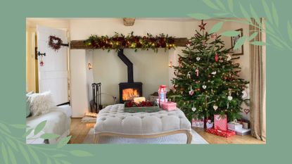 Cozy living room with log burner in a fireplace beside a real Christmas tree supporting tips for how to buy a real Christmas tree online