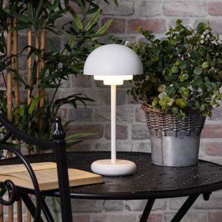 White table lamp on dining table