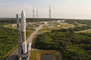 Atlas 5 Carrying Juno Spacecraft with Launch Complex 41 in Background