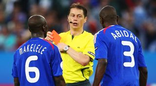 France defender Eric Abidal is shown a red card by Slovakian referee Lubos Michel against Italy at Euro 2008.