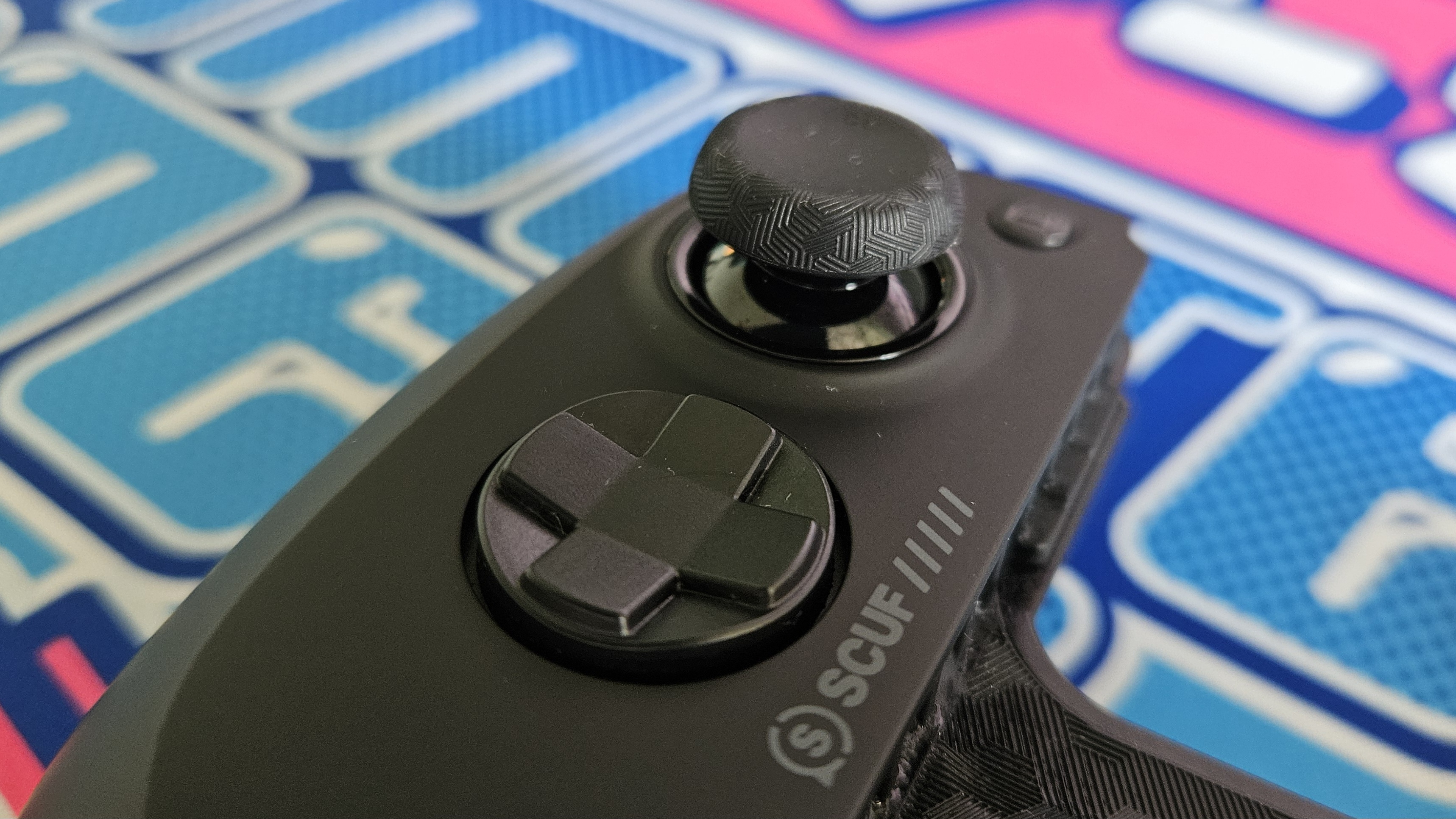 The thumbsticks of the Scuf Nomad.