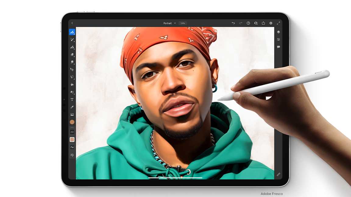 A photo of someone using an Apple Pencil 2 on an iPad Pro