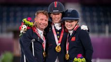The British team with their gold medals on the podium after the Paralympic dressage team competition at the Tokyo Paralympic Games