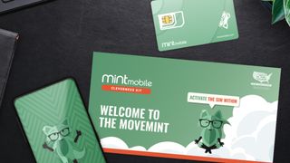 Mint Mobile SIM kit shown next to phone