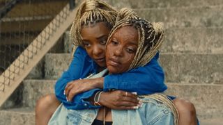 Kara Young and Mallori Johnson hugging in Is God Is.