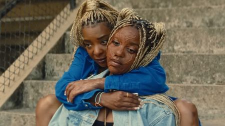 Kara Young and Mallori Johnson hugging in Is God Is.