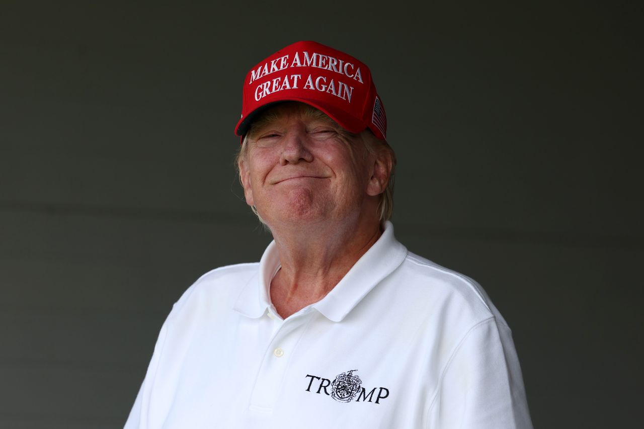 Former President Donald Trump smiles at the camera 