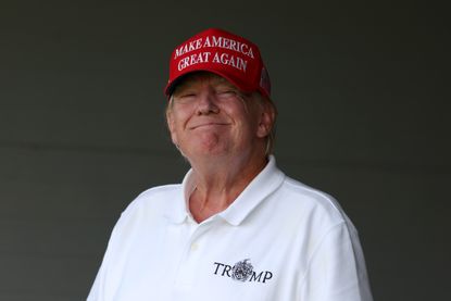 Former President Donald Trump smiles at the camera 