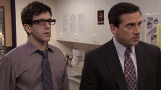 Ryan looking uncertain next to Michael in The Office