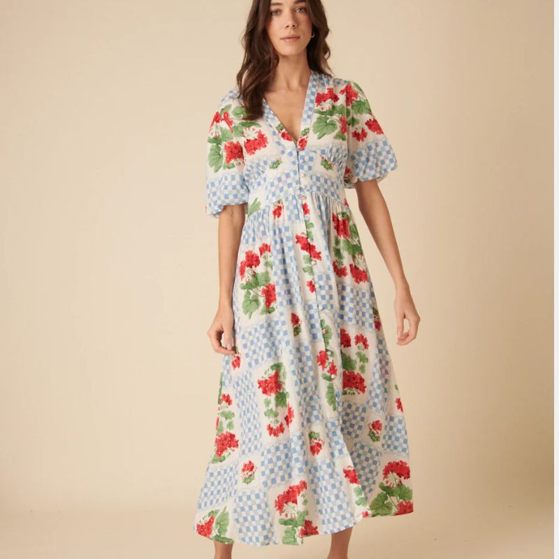A model wears a patterned Nobody's Child dress