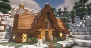 Minecraft cabin build idea - A dark oak and jungle wood cabin with a curved roof and chimney in a snowy forest.