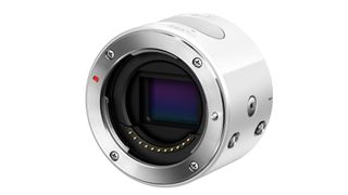 The Olympus Air A01, a white cyndrical camera with a Micro Four Thirds lens mount, is shown on a white background