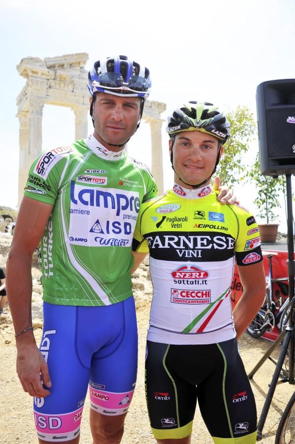 Alessandro Petacchi (Lampre - ISD) poses for a photo with another rider.