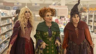 (L-R): Sarah Jessica Parker as Sarah Sanderson, Bette Midler as Winifred Sanderson, and Kathy Najimy as Mary Sanderson in a Walgreens in HOCUS POCUS 2,