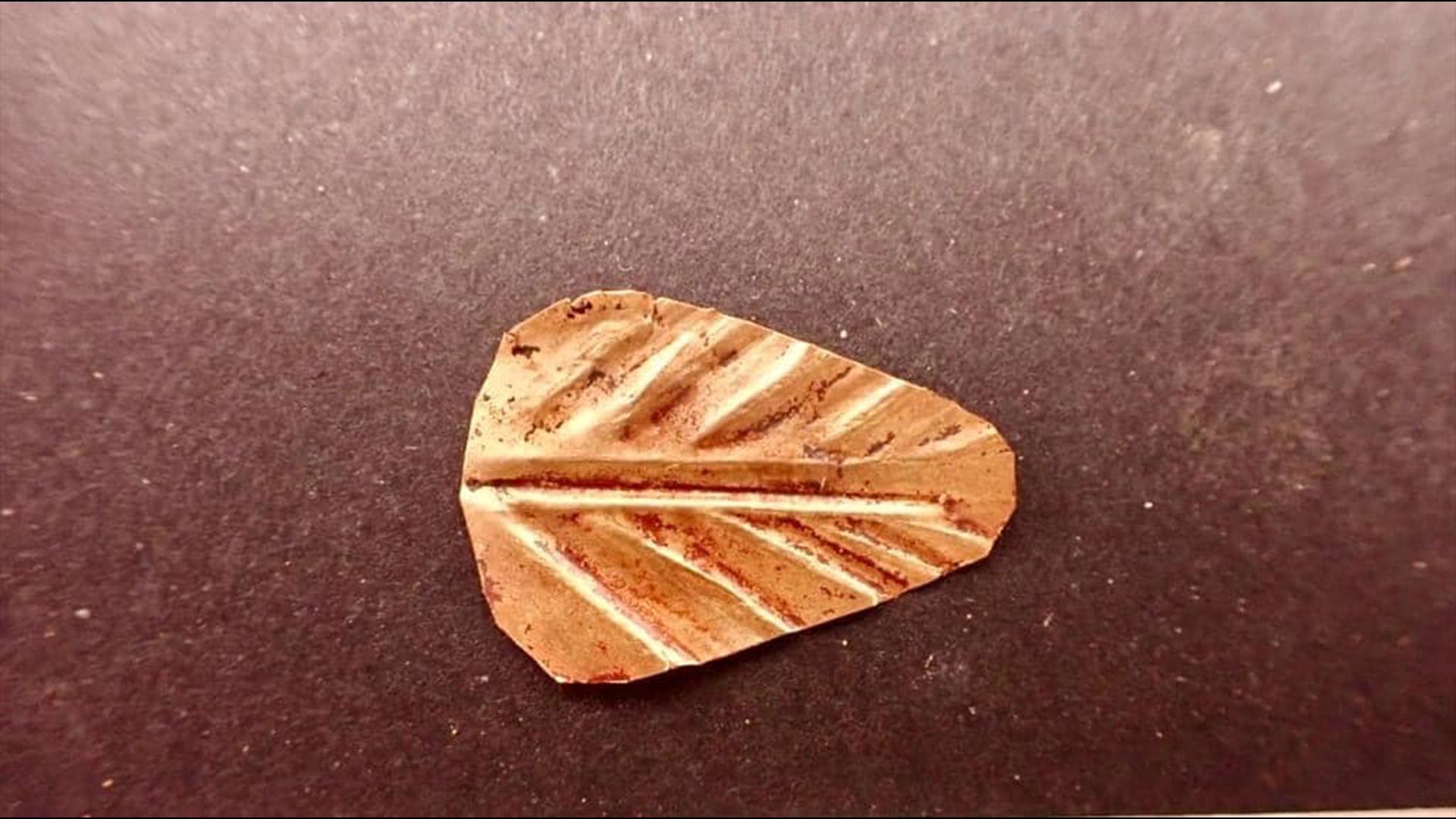 2 golden tongues symbolizing 'flesh of the gods' unearthed in ancient