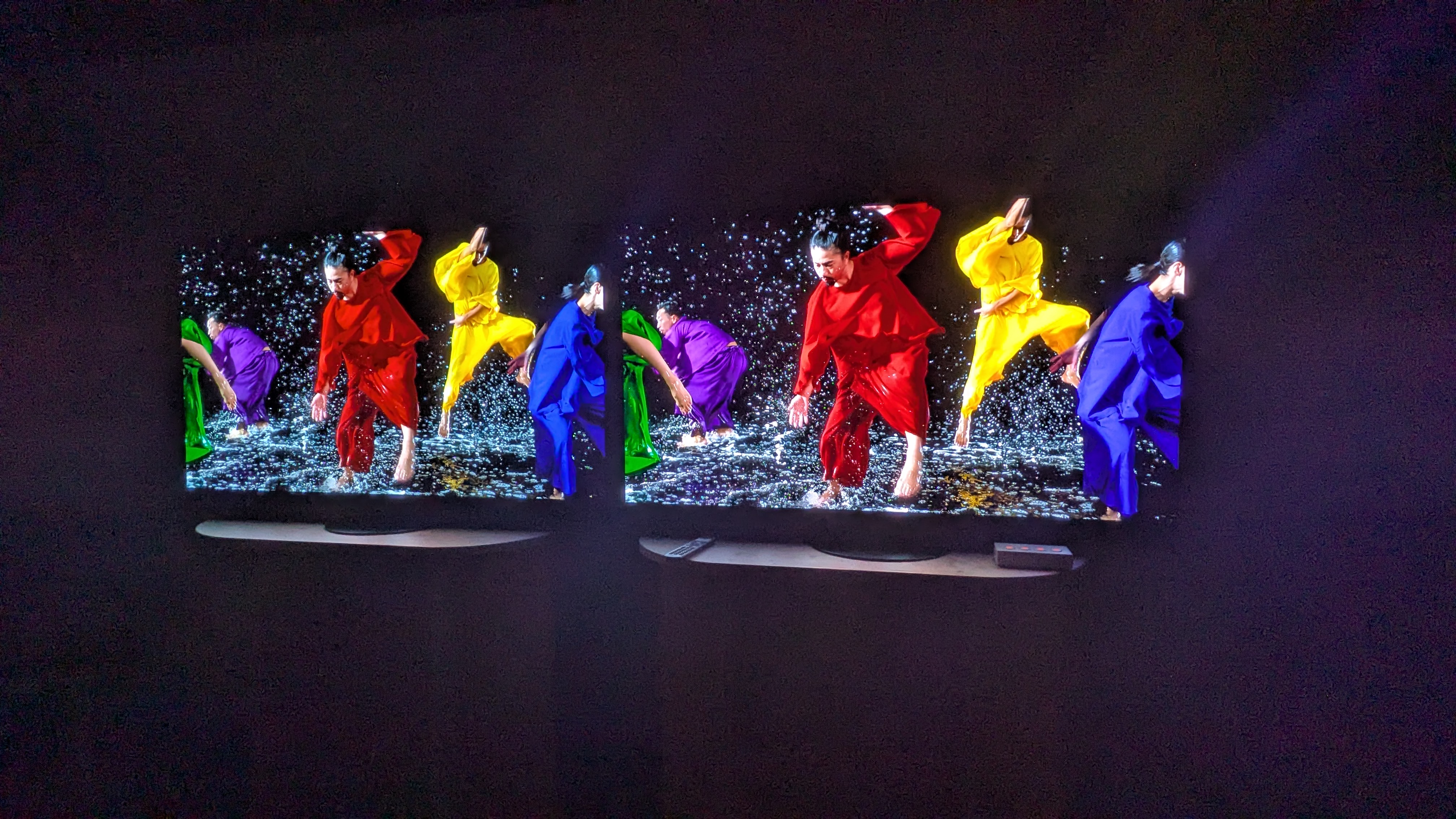 Panasonic Z95A on left and Panasonic Z95B on right with dancers in different colored uniforms on screen