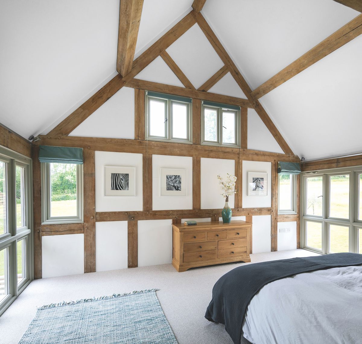 oak frame bedroom with vaulted ceiling