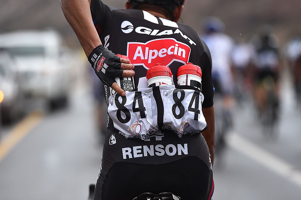 A Giant-Alpecin rider loaded up with supplies after a stop at the team car.