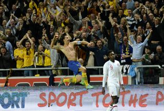 Zlatan Ibrahimovic celebrates with his shirt off after scoring his fourth goal, an overhead kick from 30 yards out, for Sweden against England in November 2012.