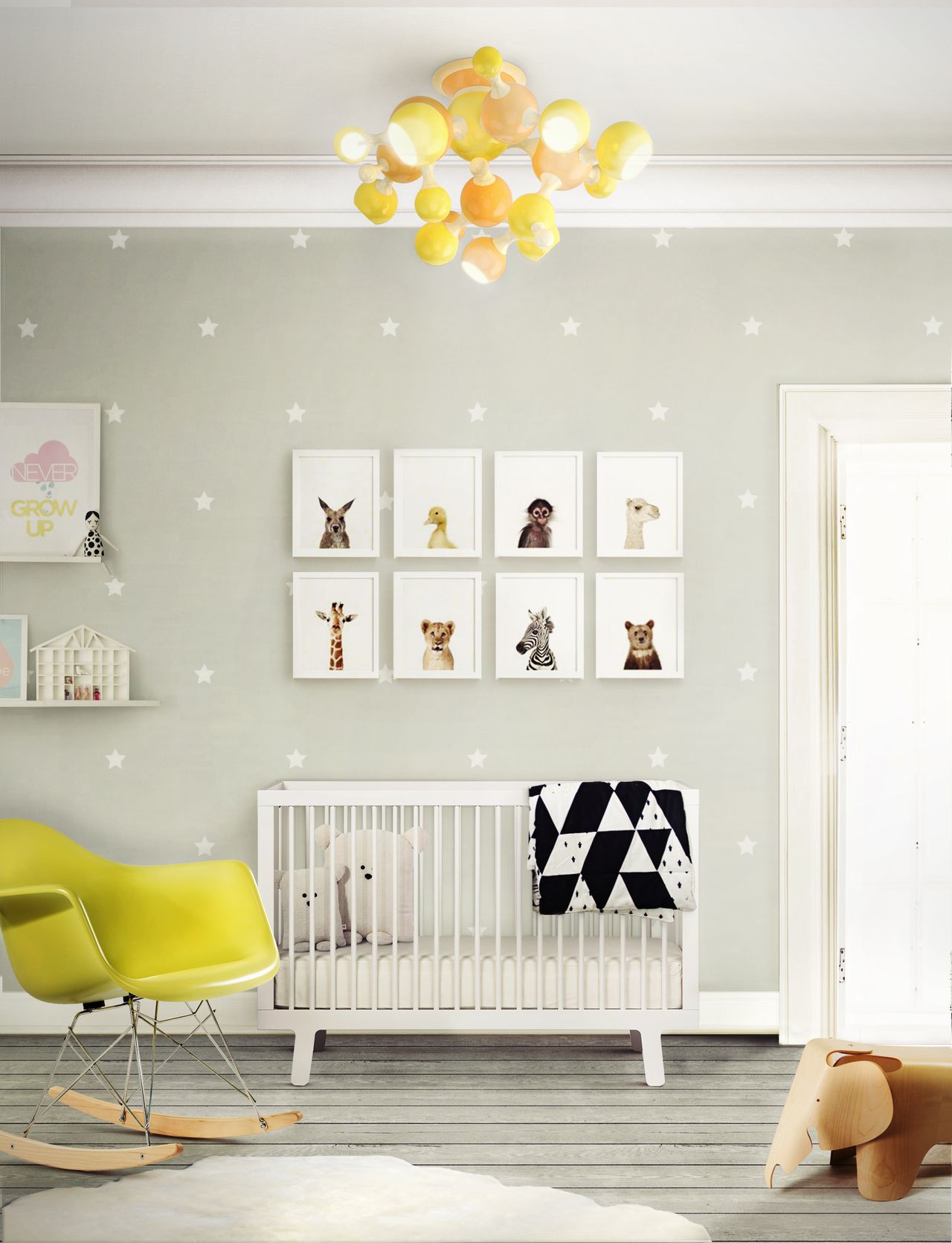 Idea of a royal baby gender-neutral nursery: Baby&#039;s nursery by Covet house with cot and chair in nursery design ideas