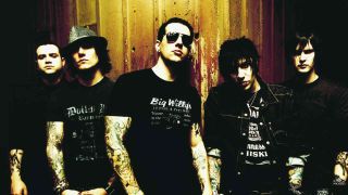 Avenged Sevenfold posing for a photo