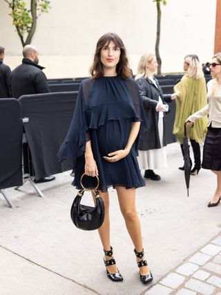 Jeanne Damas in navy blue Chloé dress