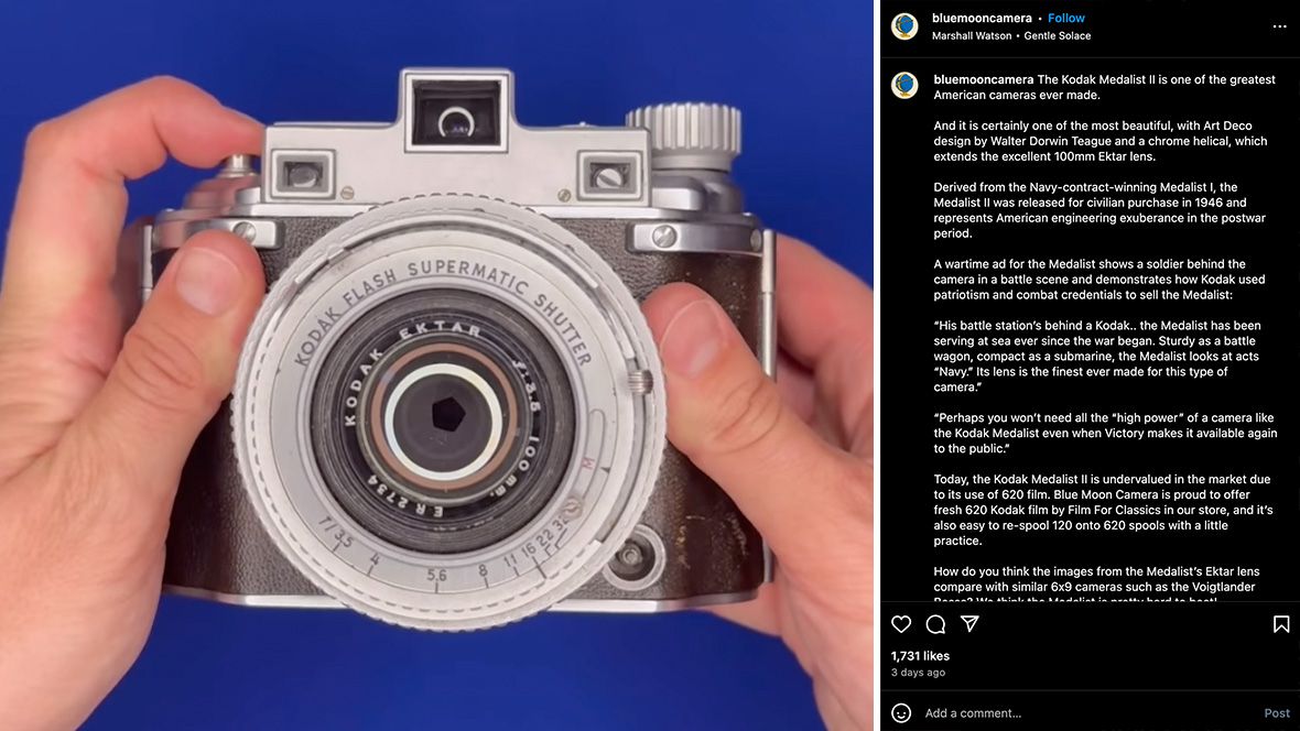 A Kodak Medalist II being handled on a blue background 