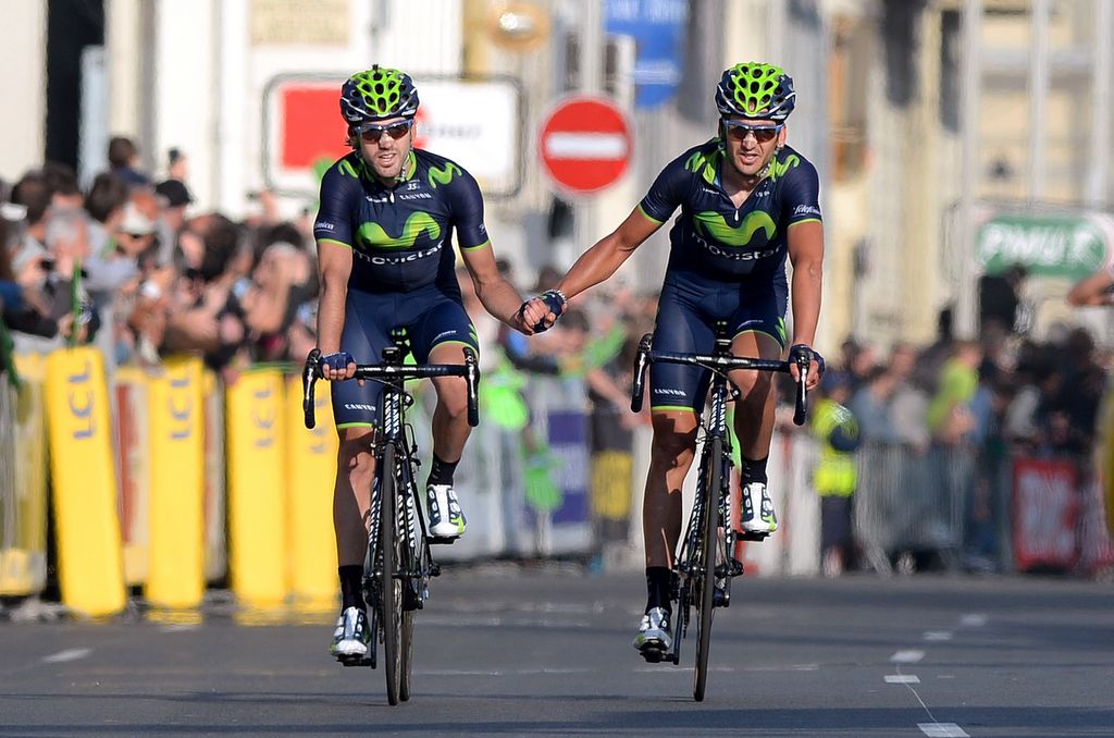 The Izagirre brothers cross the line together