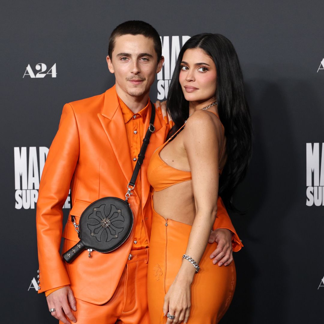 timothee chalamet and kylier jenner wear orange chrome hearts custom leather outfits on the red carpet of the la premiere of marty supreme