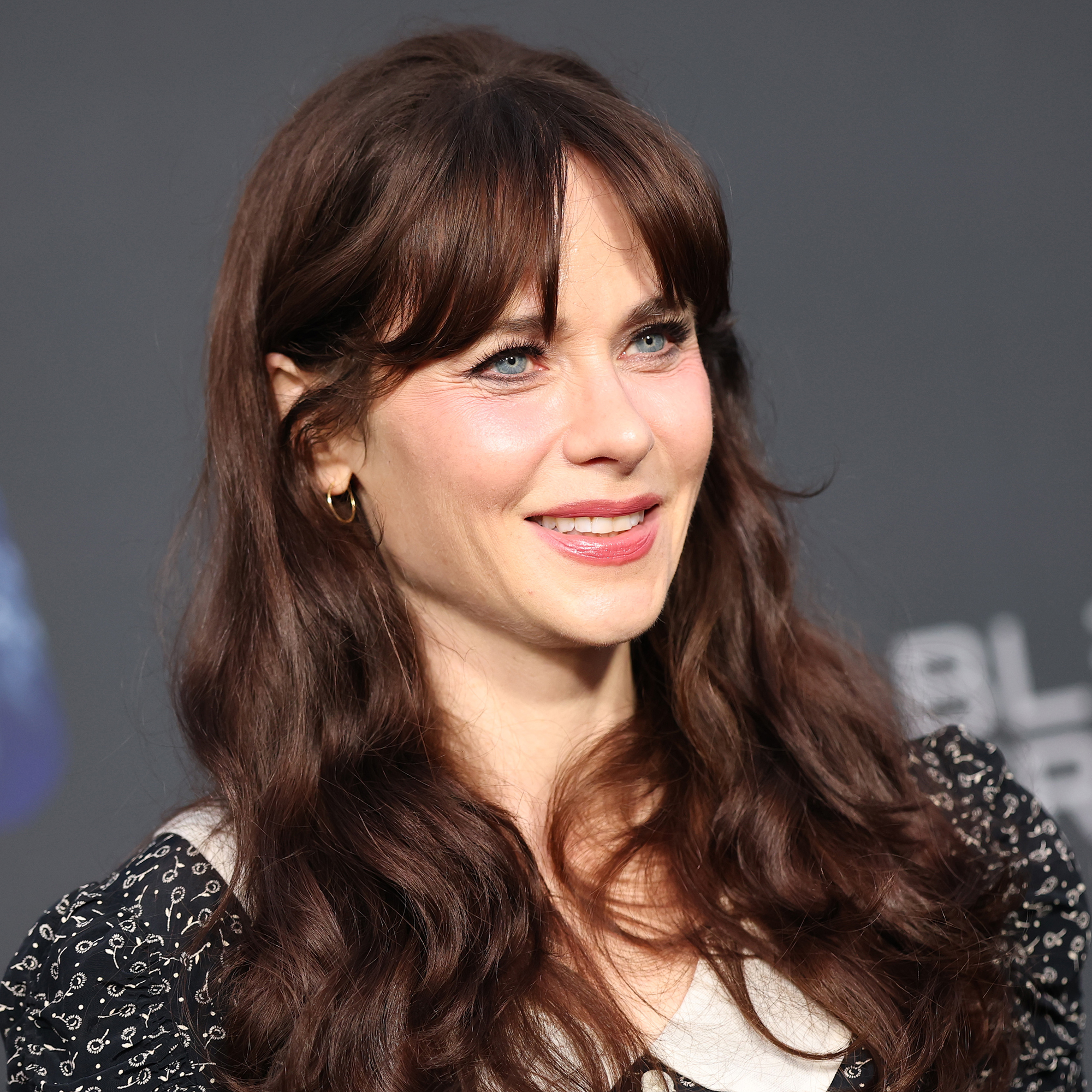 Actress Zooey Deschanel in black