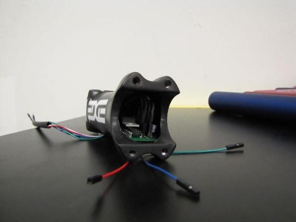 The custom brain is tucked right inside the stem.