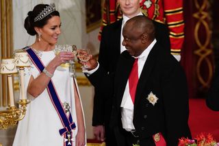 Catherine, Princess of Wales and President Cyril Ramaphosa of South Africa share a toast during the State Banquet at Buckingham Palace during the State Visit to the UK by President Cyril Ramaphosa of South Africa on November 22, 2022 in London, England. This is the first state visit hosted by the UK with King Charles III as monarch, and the first state visit here by a South African leader since 2010.