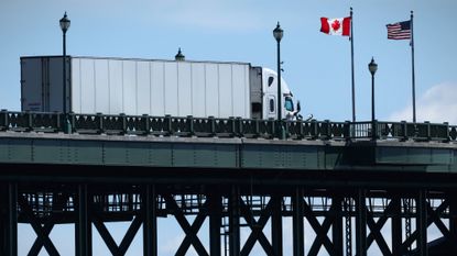 A truck passes over the Peace Bridge from Buffalo, New York, into Canada, in Fort Erie, Ontario.