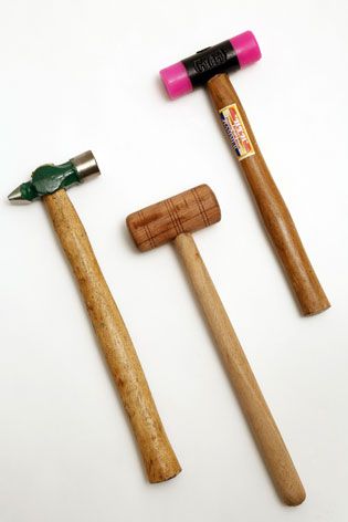 Metal, wood, and silicon hammers.