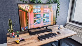 Acer Predator CG437K gaming monitor on desk