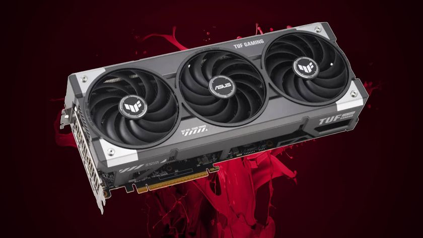 Asus Radeon RX 9070 XT TUF graphics card with red liquid in backdrop