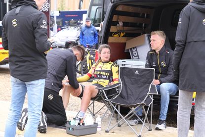 Cyclist receives a massage at a race