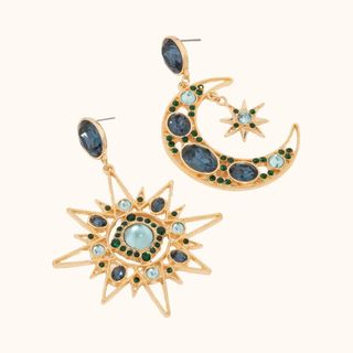 Flay lay image of gold statement earrings