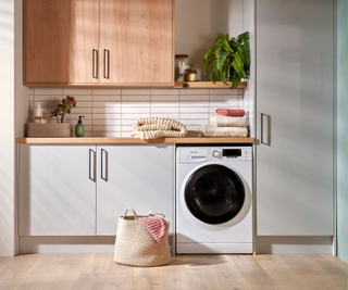 Hotpoint ActiveCare Washing Machine in a laundry room