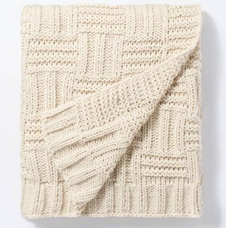 cream knitted throw 