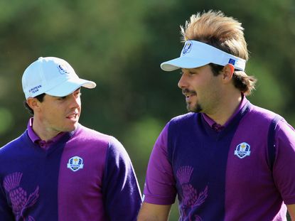 Rory McIlroy and Victor Dubuisson