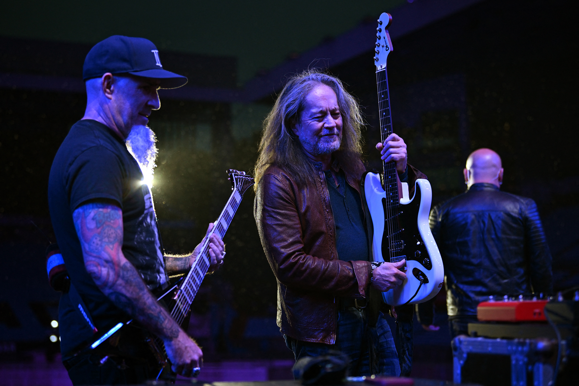 Scott Ian and Jake E. Lee wait in the wings