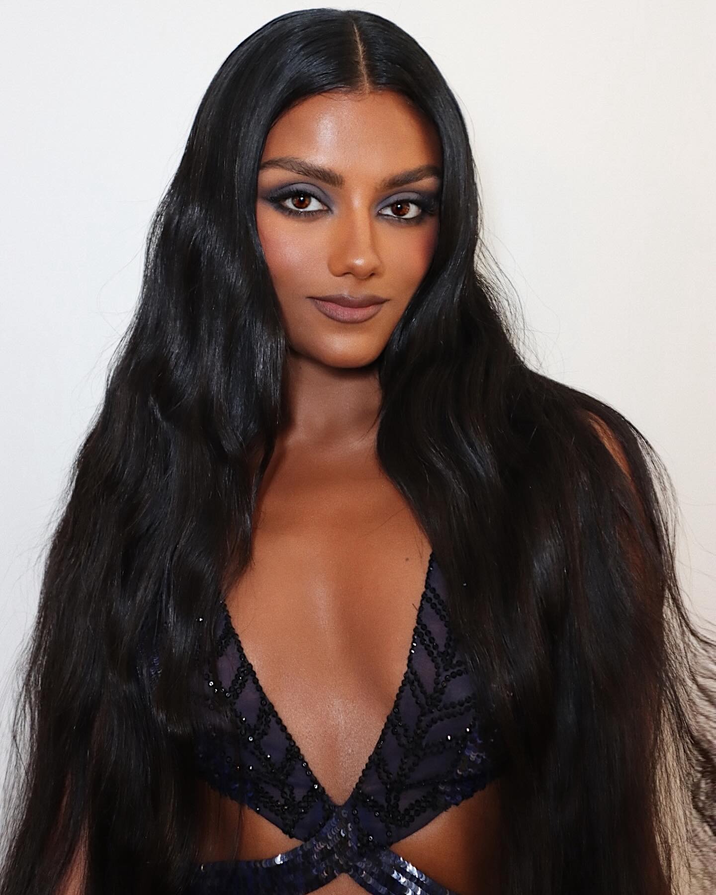 Image of Simone Ashley wearing a cool-toned eye.
